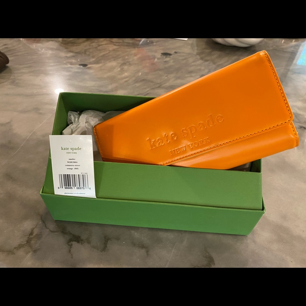 Kate Spade tri-fold orange wallet (Sander Commerce Street)
